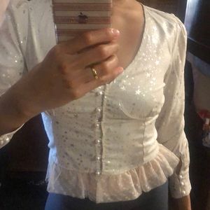 Beige top glittery / stars pattern
